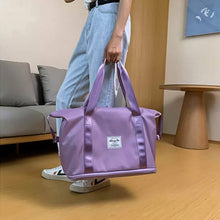 Lade das Bild in den Galerie-Viewer, Travelista™ - Die Reisetasche, die Sie immer dann rettet, wenn Sie wenig Platz im Gepäck haben!
