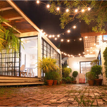 Lade das Bild in den Galerie-Viewer, Lumi™ Solar Lichterketten | Verzaubern Sie Ihren Garten mit Magie!

